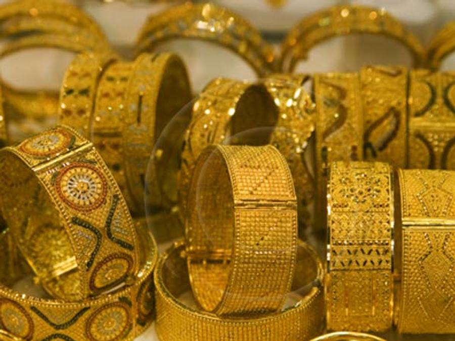Gold Slides On Global Cues, Muted Demand