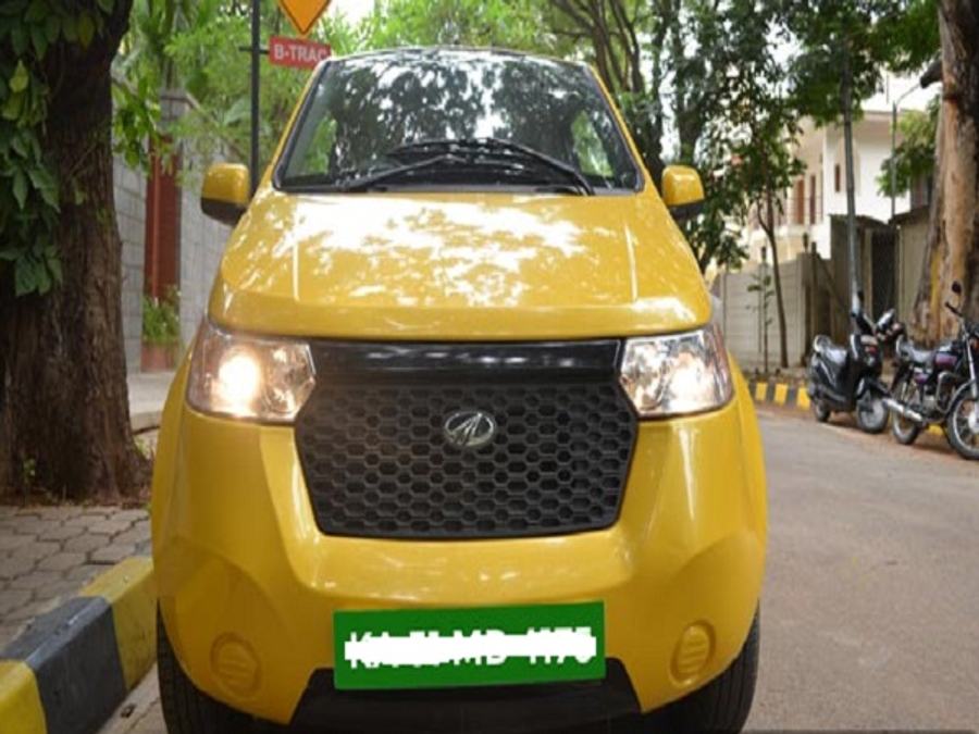 electric car with green license plate