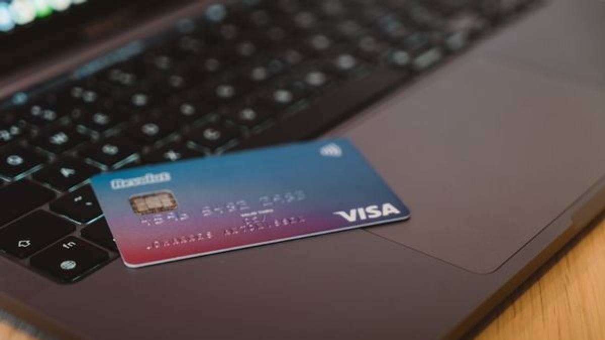 A person making an online purchase using a credit card during Indian festival