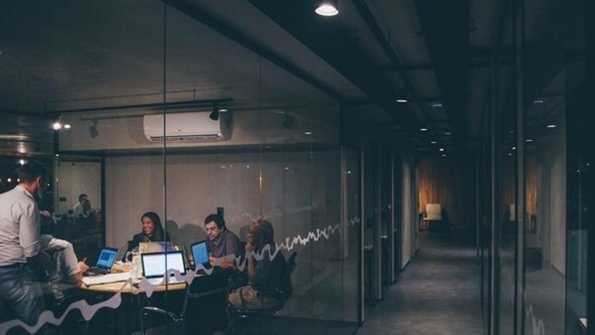 A startup CEO analyzing stock market trends on screen