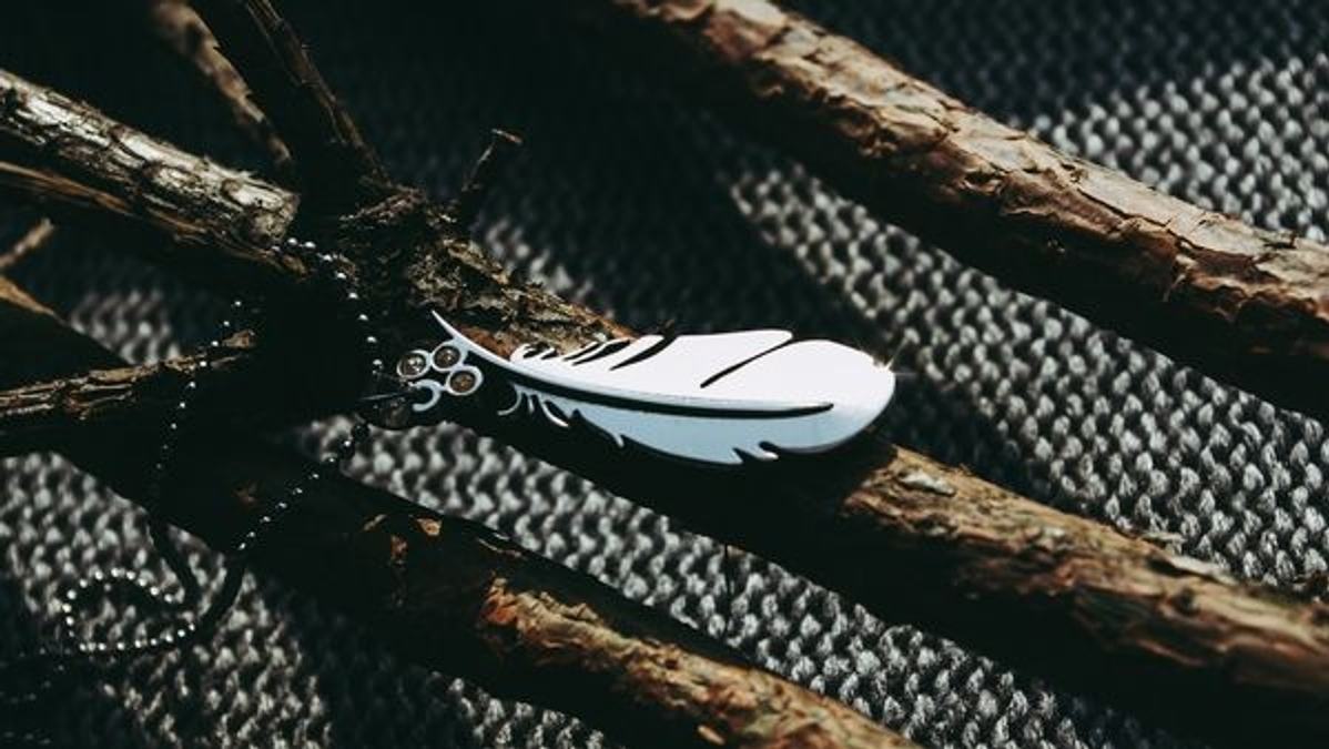 Alt text: An Indian woman showcasing intricate silver jewelry