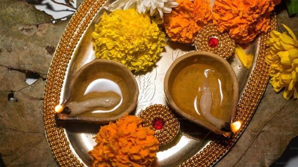 An Indian family performing the Lakshmi Puja during Diwali