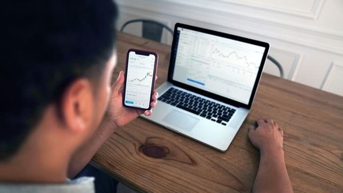 An investor managing a diversified portfolio across various sectors