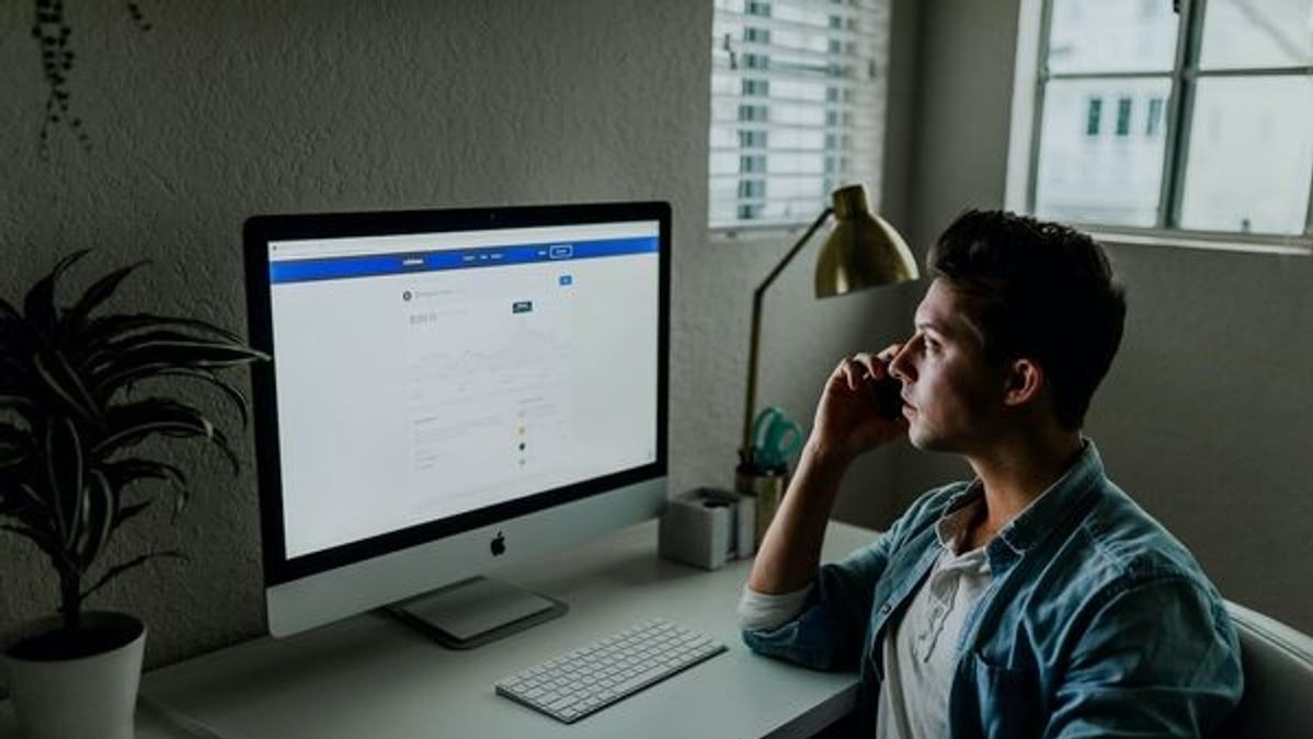 Investor researching online about stocks utilizing various resources