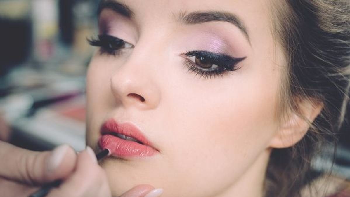 Beauty pageant contestant preparing for competition