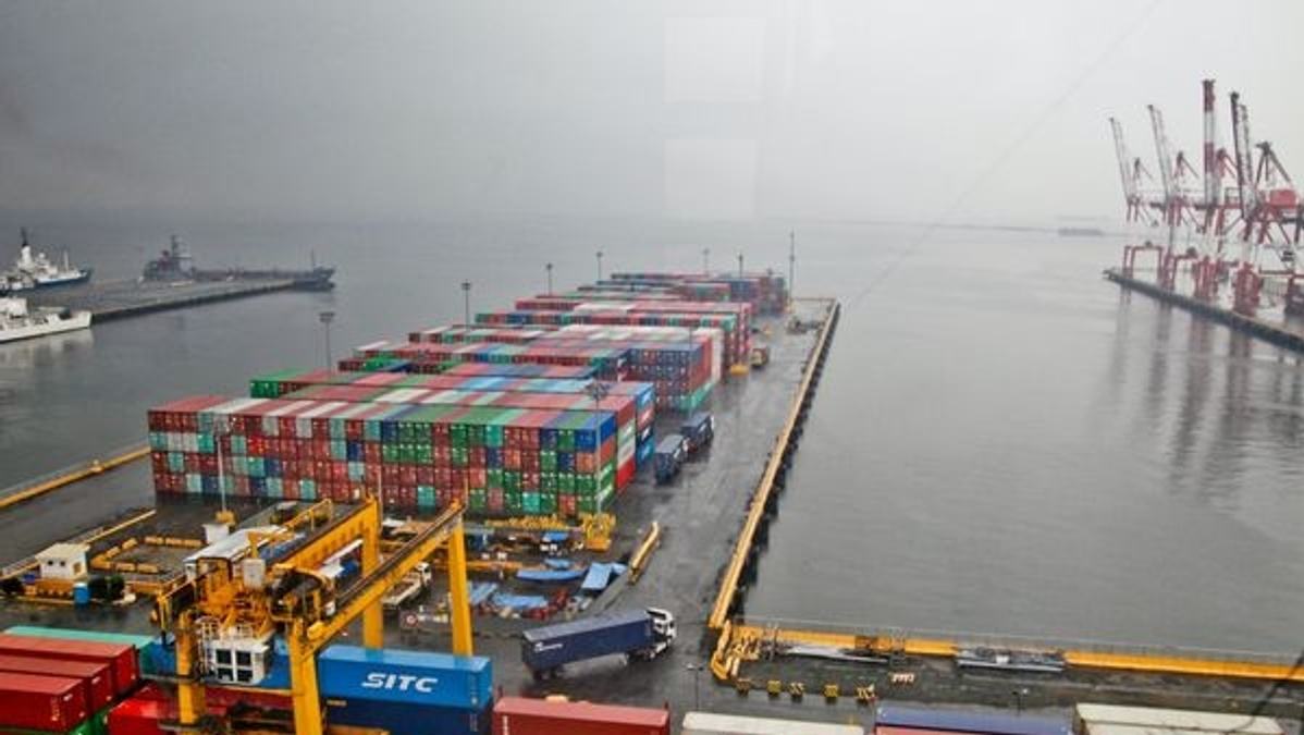 Fully loaded cargo ship in port