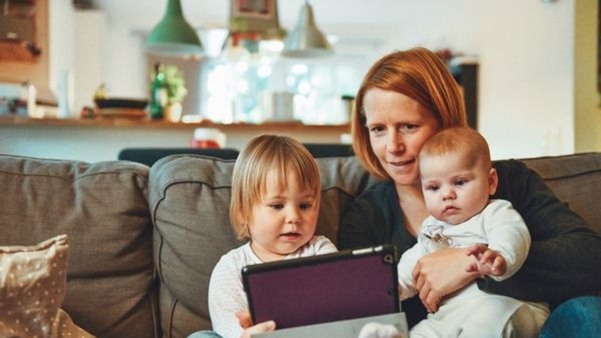 Kids playing with parents at home