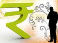 Rupee trades at 62.37; down 5 paise over Monday's close