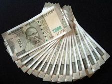 డాలర్ తో పోల్చి చూస్తే పుంజుకున్న రూపాయి మారకం.