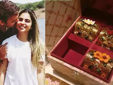 బంగారు డబ్బాలో పెళ్లి పత్రిక వైరల్ అవుతున్న ఇషా అంబానీ పెళ్లి పత్రిక 