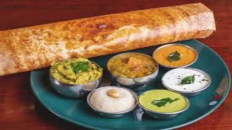 Success Story: कपल ने जॉब छोड़कर की बिजनेस की शुरूआत, 99 तरह के बेचते है डोसा