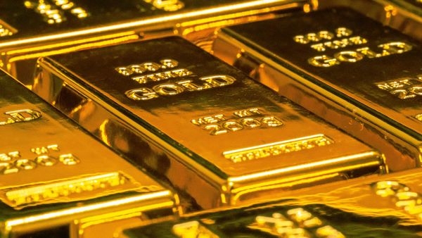 Stack of gold bars representing investment