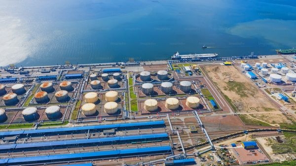 An image displaying a global oil refinery as illustration of oils role in the global economy