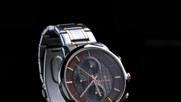 Titans store with a background of rising stock graph