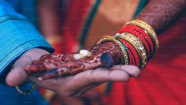 A bride-to-be choosing her wedding lehenga