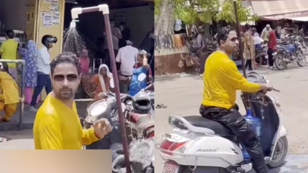 AC விலை உயர்வு.. குளிச்சுக்கிட்டே ஸ்கூட்டரில் செல்லும் வாலிபர்.. வெயிலுக்கு ஜிலு ஜிலுன்னு ஒரு ஐடியா!