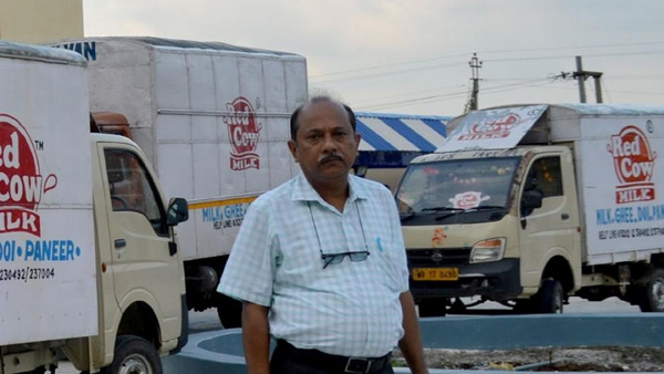 success story of Narayan majumdar red cow dairy business in bengal