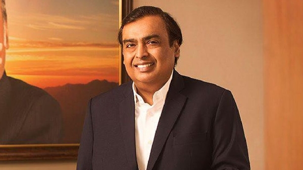 Mukesh Ambani presented his son s wedding invitation with Congress president Sonia Gandhi