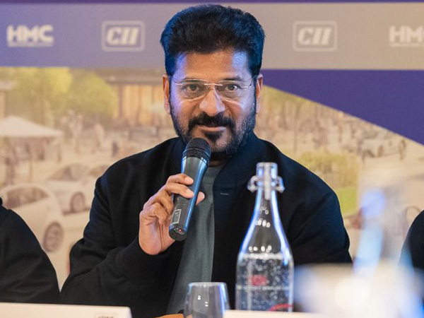 Davos 2025 CM Revanth Reddy clarifies he is not Competing with AP but With Singapore Dubai