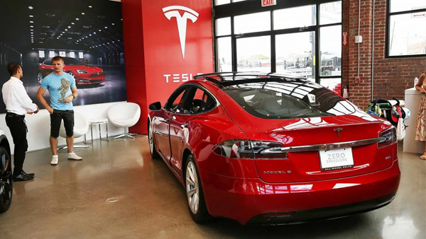 Tesla s mass entry Huge showroom in Mumbai Do you know how much the cars cost