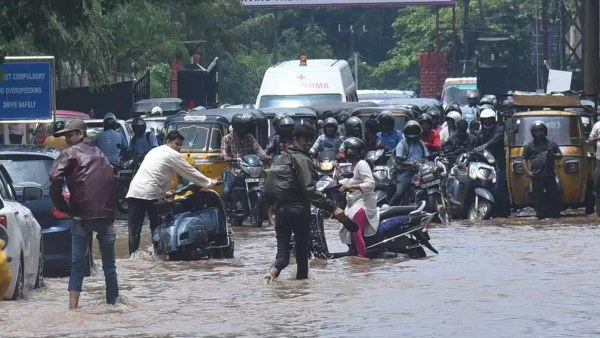 Hyderabad rains heavy rain in Hyderabad Hyderabad waterlogging Hyderabad traffic jam Hyderabad weather update Hyderabad rainfall news Hyderabad flood situation Hyderabad roads blocked Hyderabad work from home Hyderabad rain latest news heavy rain