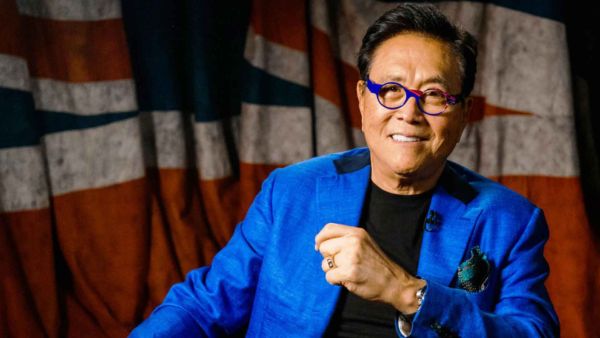 robert kiyosaki us dollar warning brics gold backed currency claim bitcoin gold silver hedge